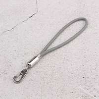 Темно -серая веревка с ключом длиной 16 см