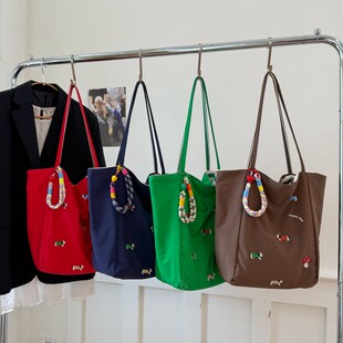 大容量刺绣帆布单肩包女2026新款简约休闲通勤单肩包高级感托特包