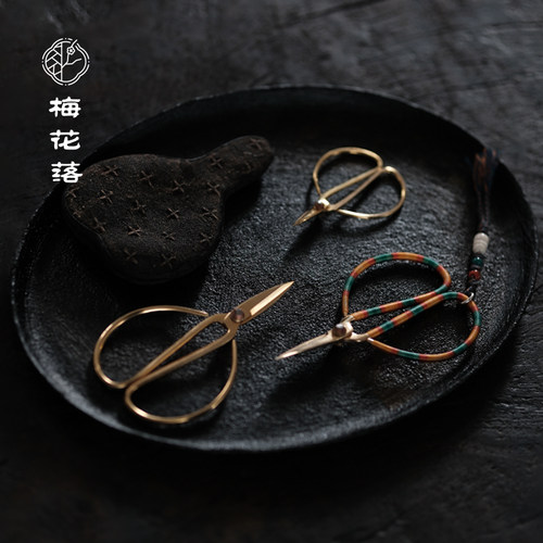 梅花落80年代剪刀镀金茶叶泡袋剪