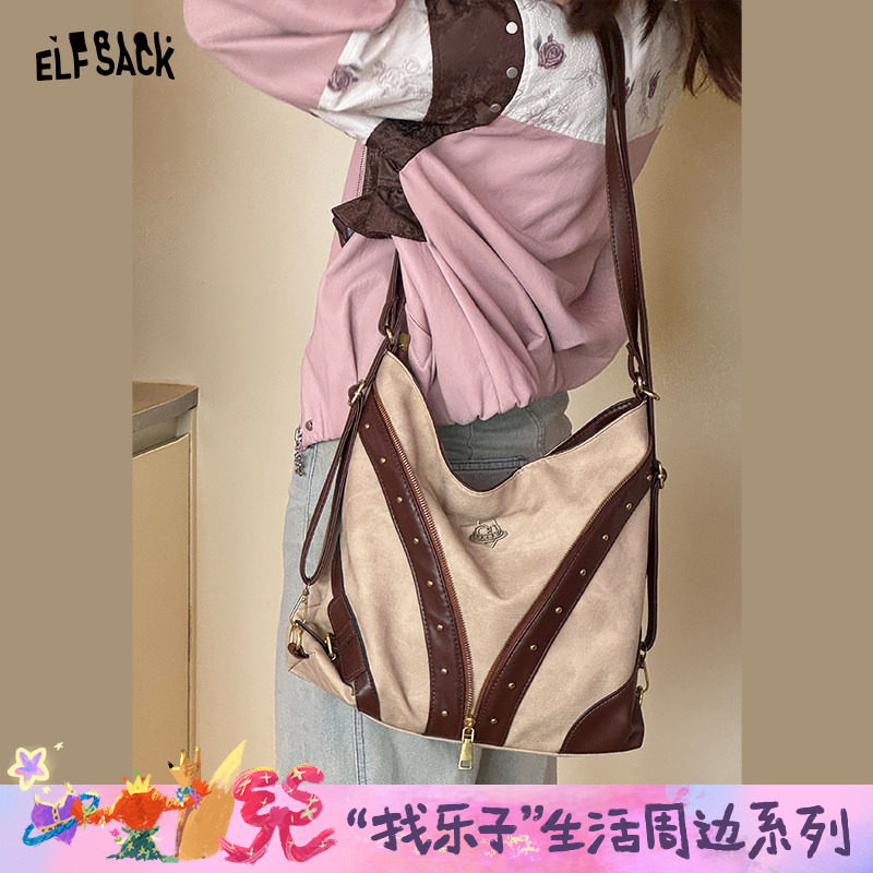 妖精的口袋撞色拼接铆钉单肩包2026年新款设计感甜酷PU皮斜挎包