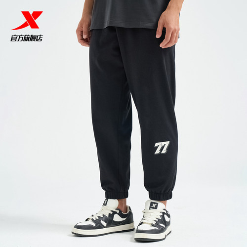 特步运动裤2025夏季新款黑色宽松透气男子针织九分裤976229840044