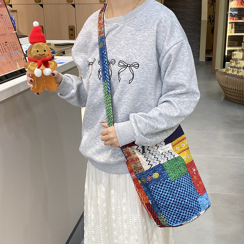ins韩风撞色水桶包包女日系百搭牛仔包双面背斜挎包