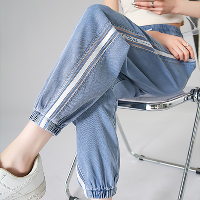 天丝牛仔裤女夏季薄款2026新款高腰显瘦休闲松紧腰冰丝束脚哈伦裤