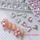 美甲饰品凹槽大歪心钻2025新款 华子多切面水晶白色粉爱心钻石爆闪