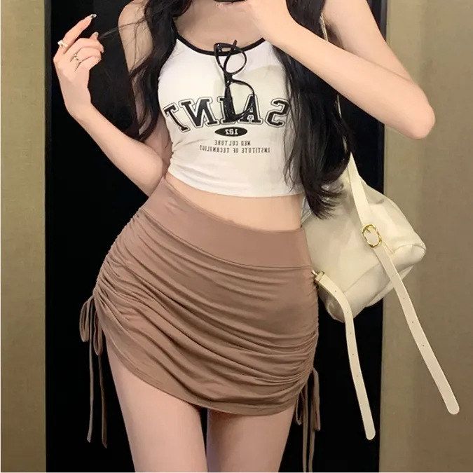 高腰抽绳紧身黑色包臀半身裙女设计感小个子裙裤甜辣短裙跨境货源
