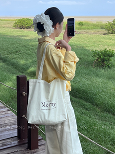 Wfei韩系慵懒风单肩包简约字母印花帆布包大容量百搭通勤托特包女