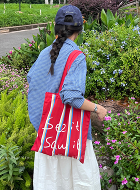 Wfei新款小众设计大容量百搭撞色通勤帆布包条纹红色字母单肩包