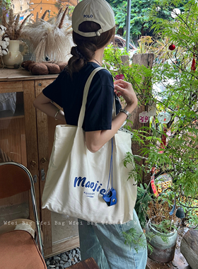 Wfei大容量白色帆布包慵懒风字母印花单肩包小众设计感百搭托特包