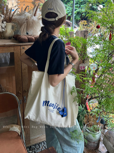 白色帆布包慵懒风字母印花单肩包