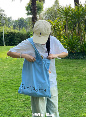 Wfei小众设计感蓝色字母帆布包薄款慵懒风单肩包大容量通勤托特包