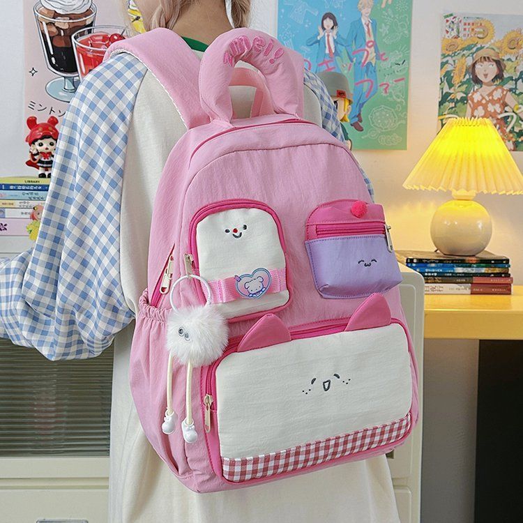 日系少女卡通书包初中女生高颜值可爱双肩包小学生大容量减负背包