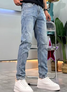 高端一刀割破洞牛仔裤男九分2025夏季新款韩版潮流蓝色修身小脚裤