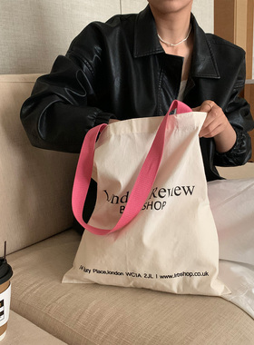芝士商店~韩系粉色单肩帆布包女春季松弛感通勤帆布袋白色包包ins