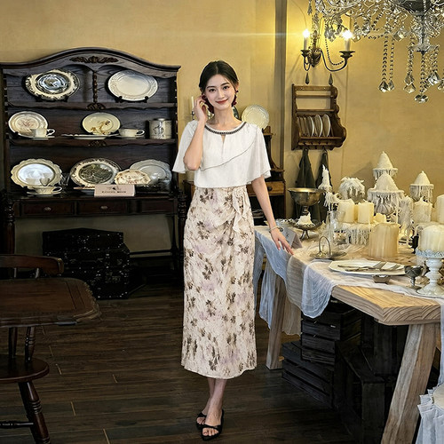 有里布2026夏季新款女复古风高奢假两件遮肉显瘦气质连衣裙D8932