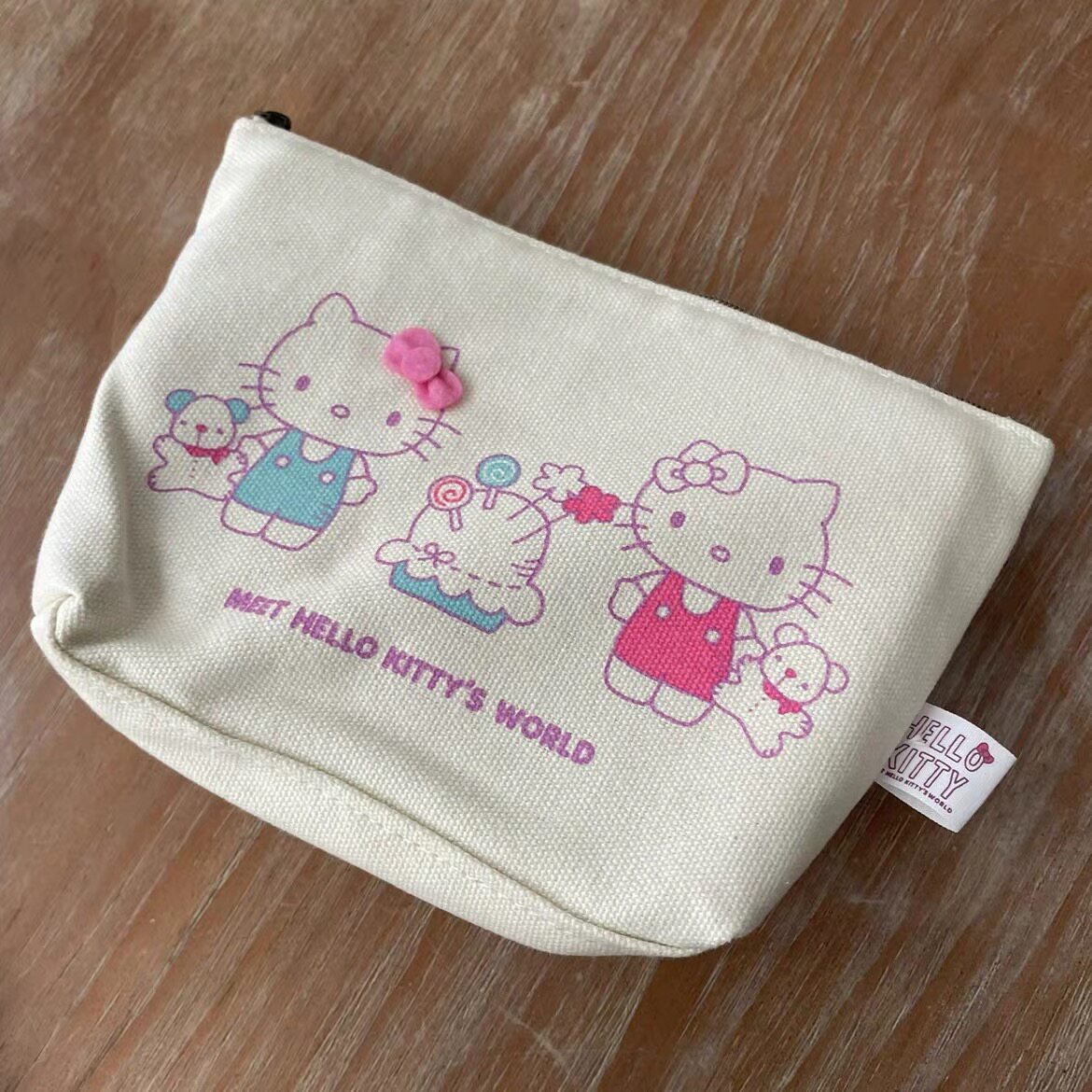 日本HelloKitty 文具收纳包帆布日单收纳袋学生零钱包可爱化妆包