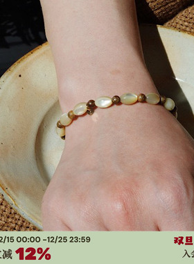 海螺贝米粒*檀木珠手串猫眼手链