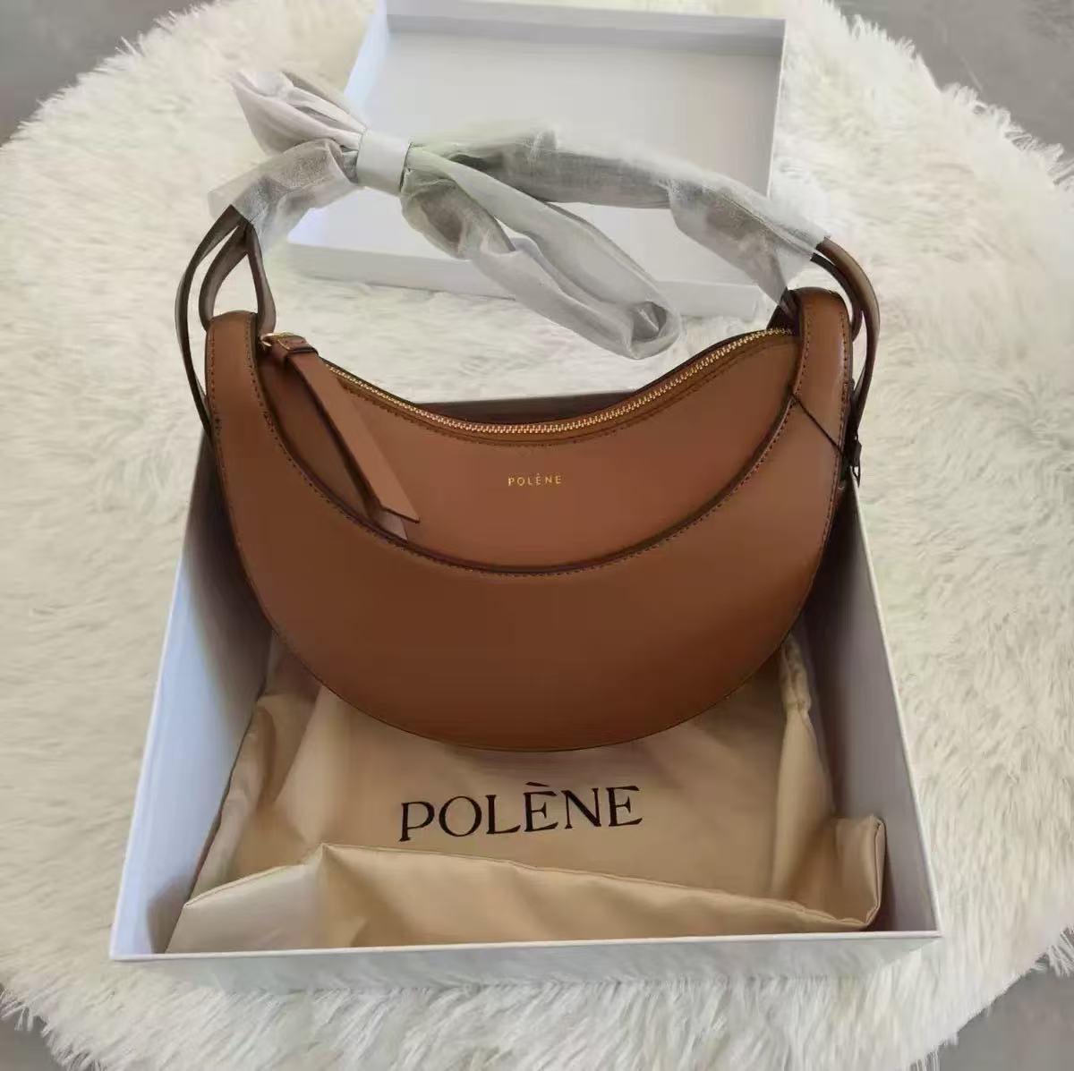 牛皮polene月牙包2026通用款女包