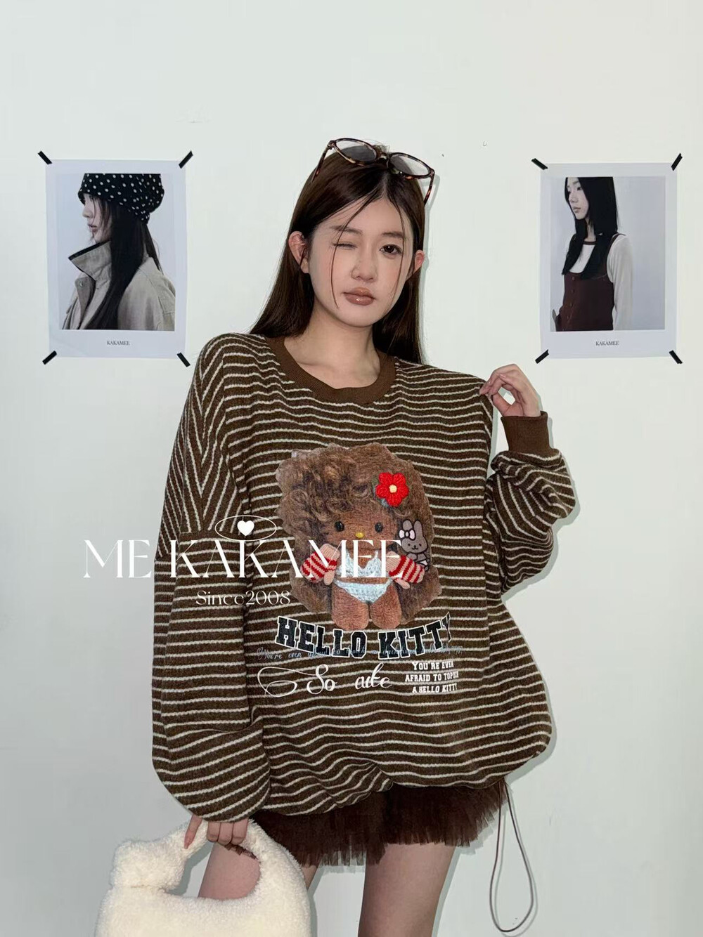 KAKAMEE冬新品条纹黑皮KT猫设计感立体图案宽松大版卫衣S3715