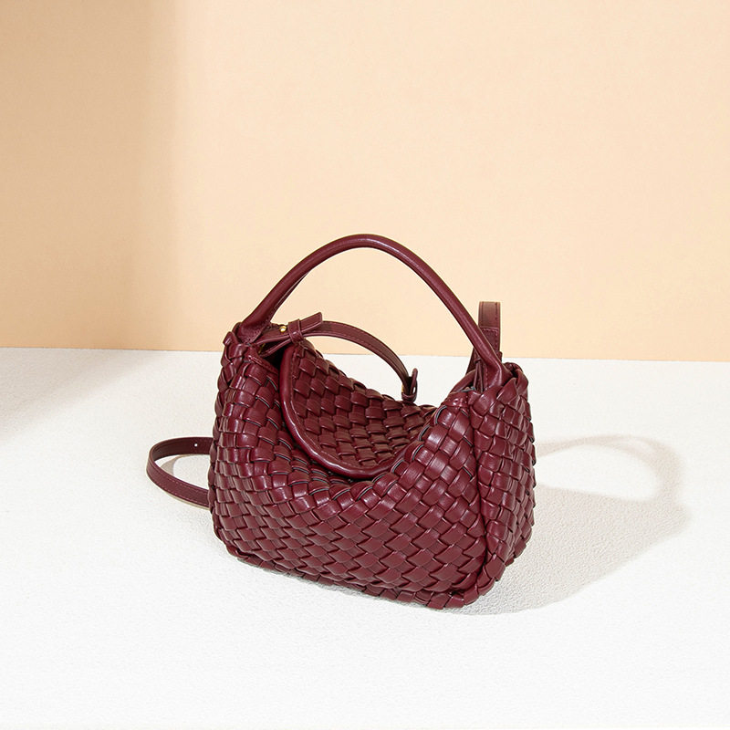 通勤出差新款感编织包轻奢pu纯手工手拎包单肩斜挎元宝饺子包