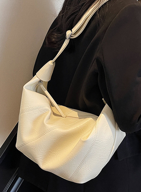 韩系慵懒风包包女士2026新款春夏时尚百搭单肩斜挎包高级感饺子包