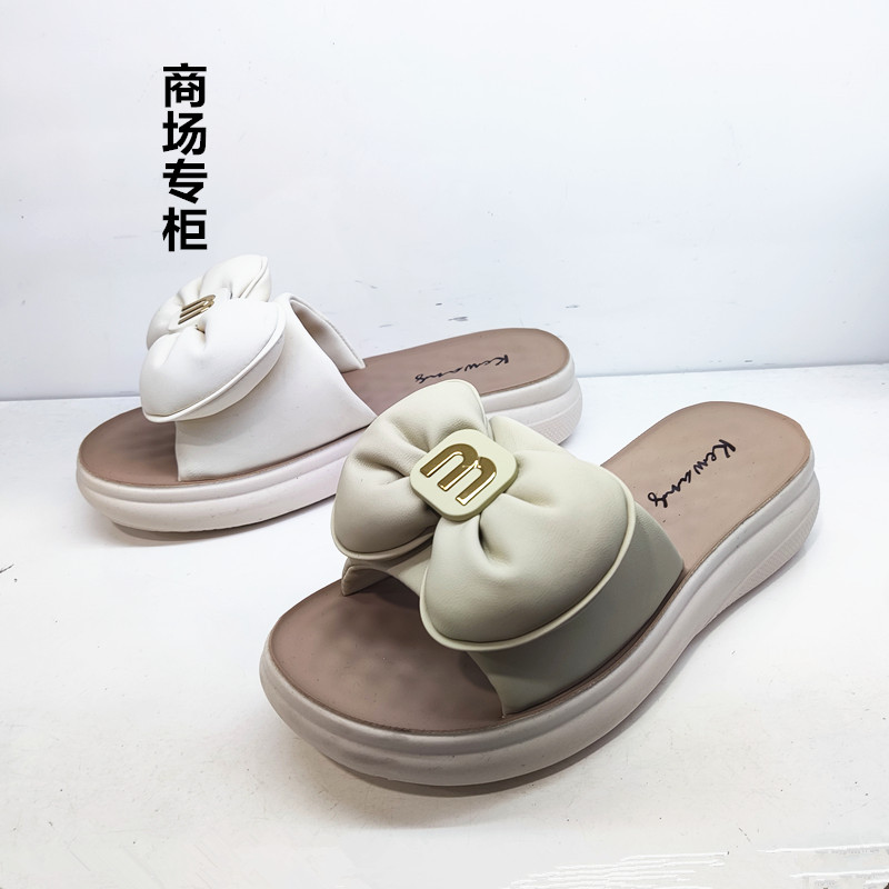 花朵青年平跟蝴蝶结露趾凉鞋时尚图片
