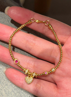 金色爱心算盘珠珠手串爱心粉钻