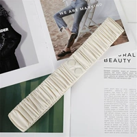 Цвет светло-абрикосовый (на пуговицах), длина 66 см.