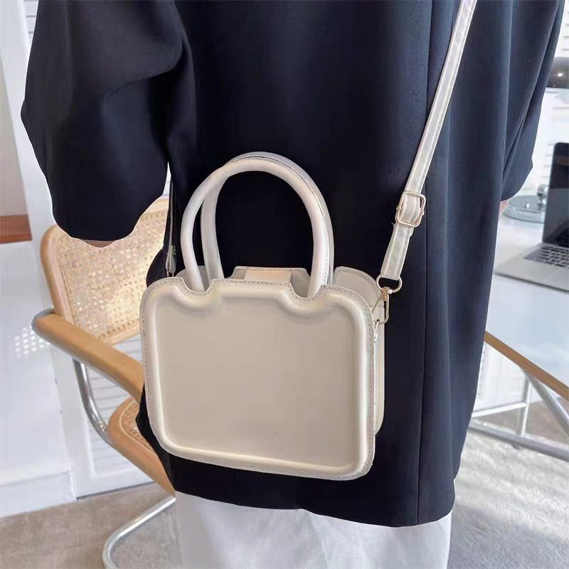 新加坡小西K正女米白色百搭休闲时尚斜跨包饼干包单肩包手提包