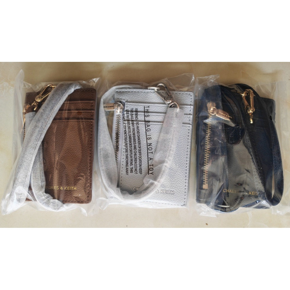 代工厂原单新加坡小CK简约挂绳简约实用迷你零钱包卡包