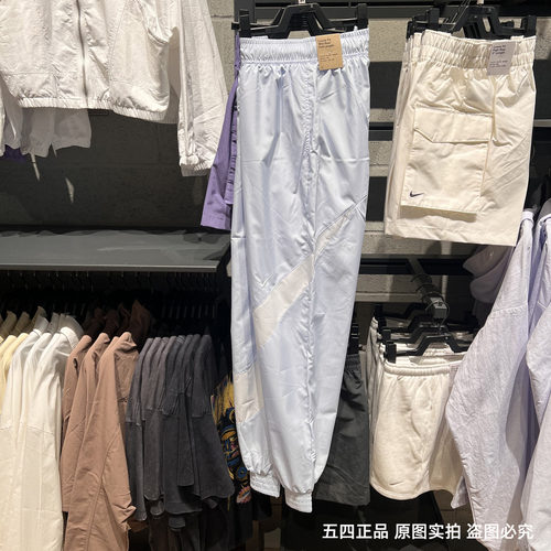 NIKE耐克女子大勾印花LOGO透气舒适束脚运动梭织长裤HM8977-423