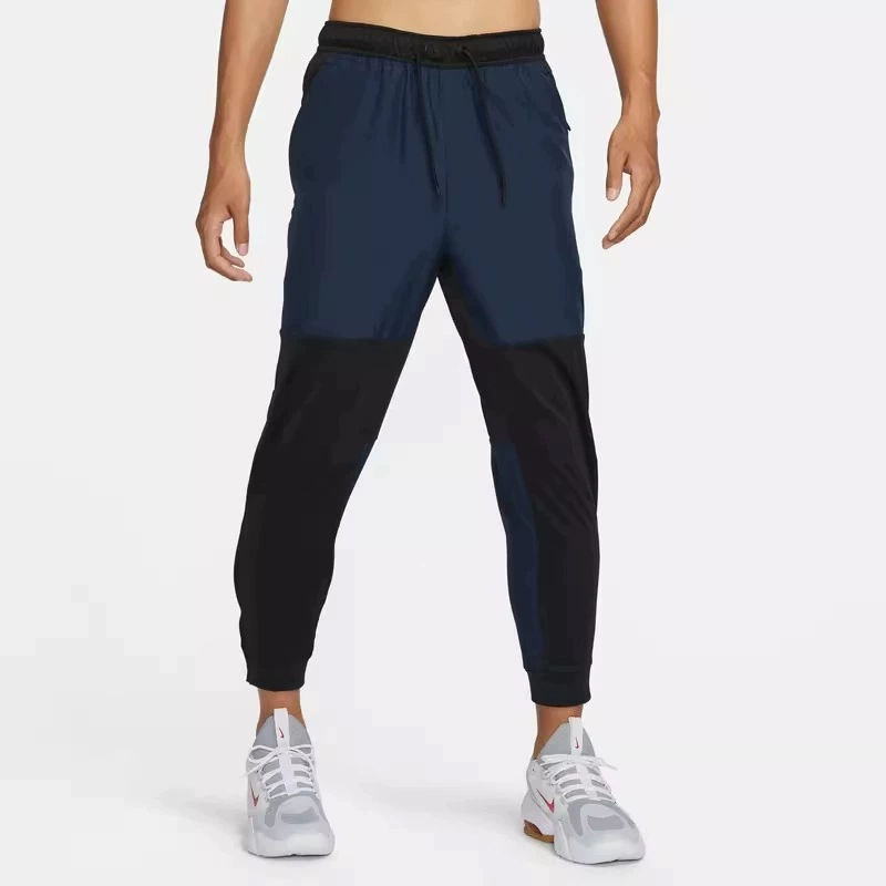 正品Nike/耐克冬季新款男子复古拼接休闲束脚宽松工装长裤 FB8602