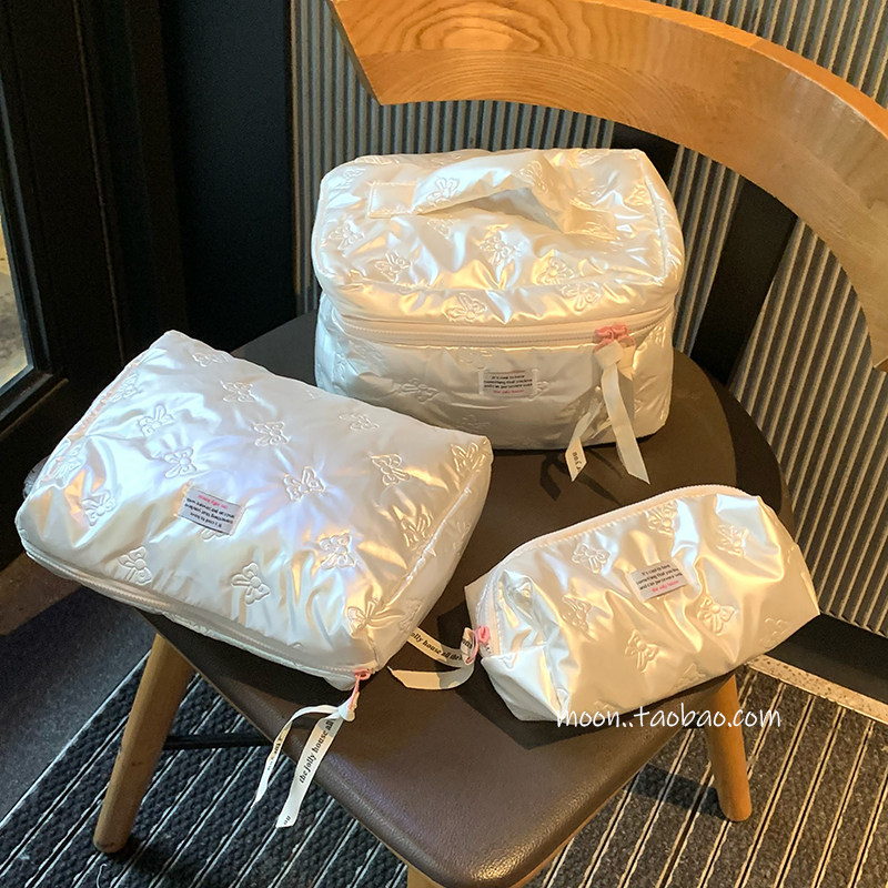 ins奶油风蝴蝶结化妆包女大容量便捷旅行pu收纳包手提分区洗漱包