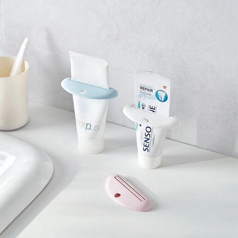 家用手动挤压器牙膏夹子洗面奶护手霜挤牙膏器小样卷压器