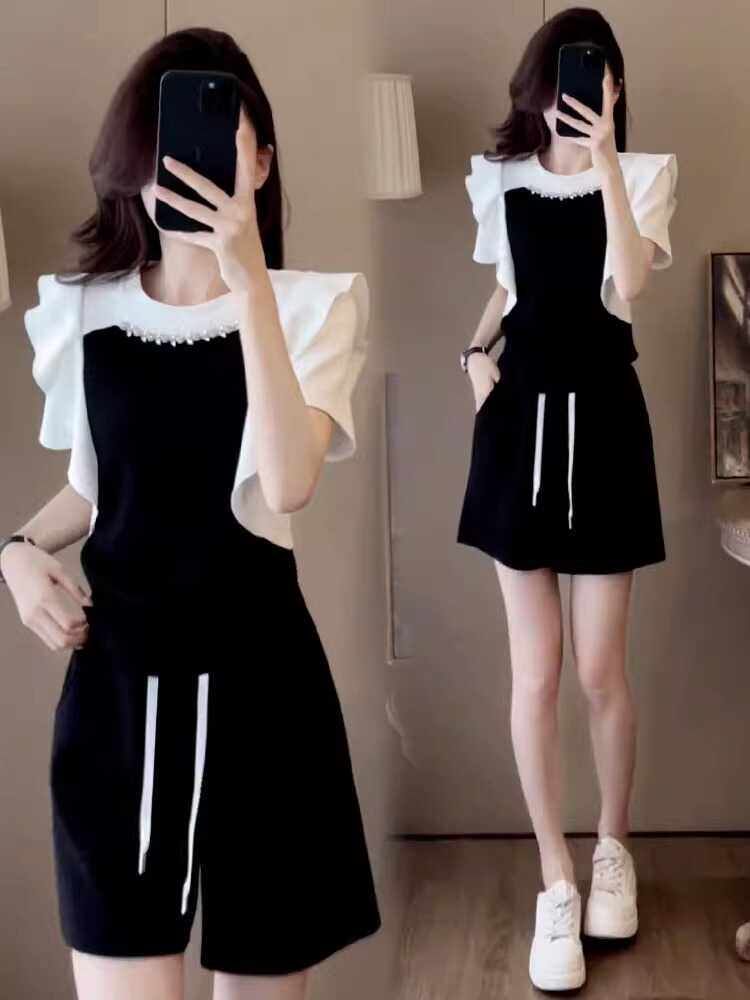 时尚设计感荷叶边套装女士2024夏季新款拼接t恤运动服短裤两件套,女装/女士精品,时尚套装,淘宝优惠券,粉丝福利购,淘宝优惠卷