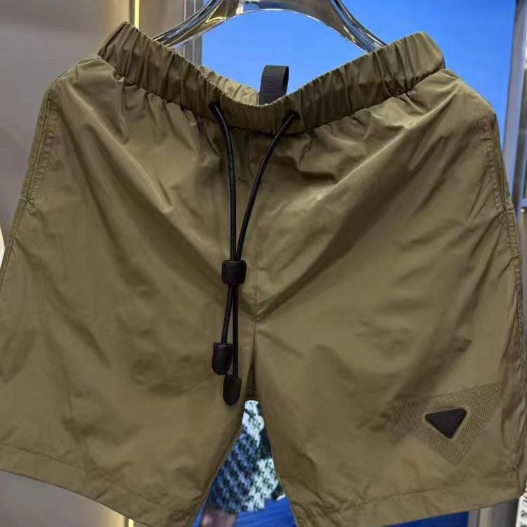 (网络图慎用有大货)轻奢小标潮休闲短裤速干沙滩裤313B-K680-P40,男装牛仔裤,星座313B
