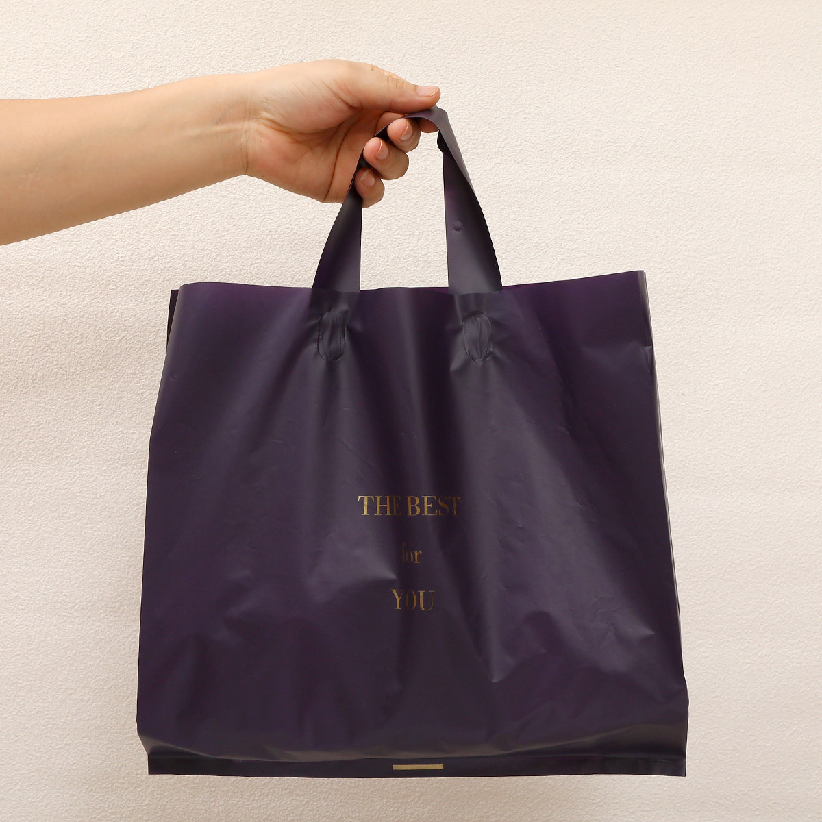 秋冬新款轻奢紫服装店手提袋子印logo女童装衣服塑料袋订制包装袋