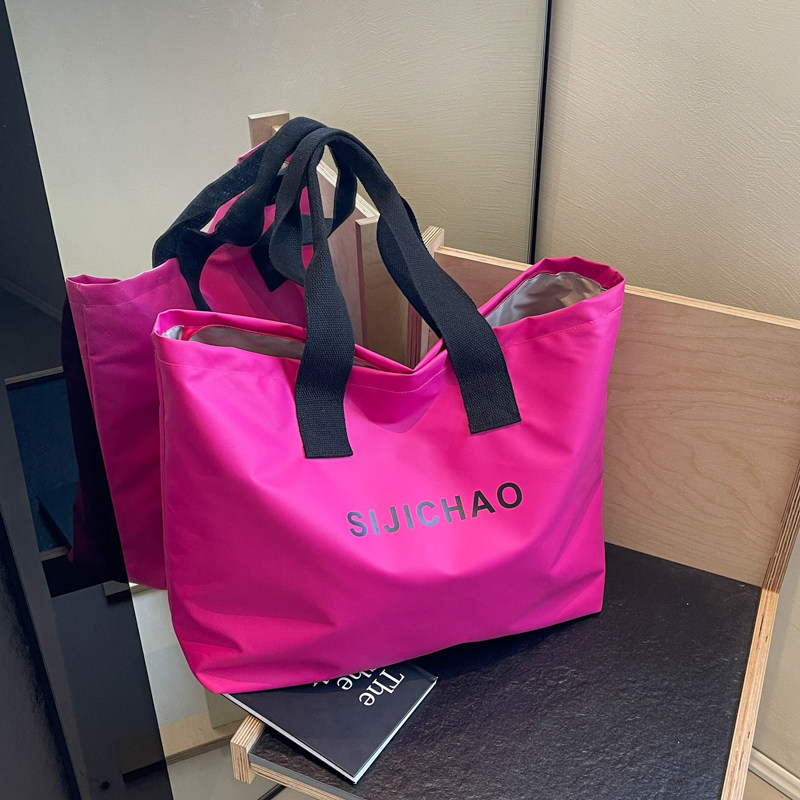 手提大容量旅行包袋女通勤单肩托特包购物袋待产妈咪包超大糖果色