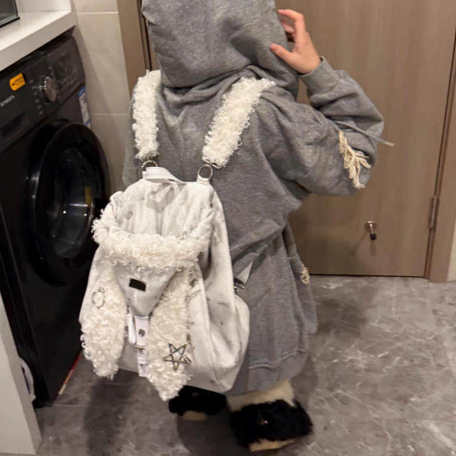 rebirth野生设定兔耳朵双肩包女2025秋冬可爱上课毛毛包斜挎书包