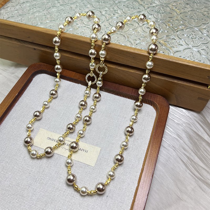 美拉迪轻奢仿珍珠项链女金色链条百搭高级感毛衣链中长款锆石项链