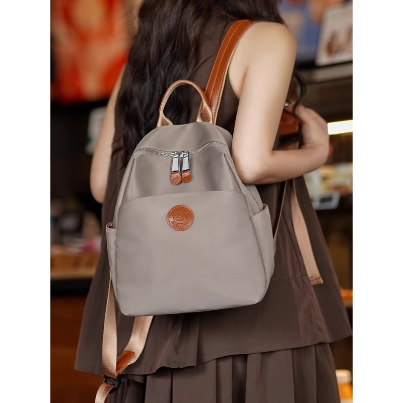 法国ZAMP双肩包女2025新款时尚牛津布轻便出游背包户外登山旅游包