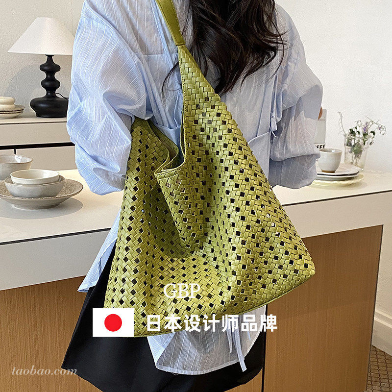 日本ファッションバッグ大容量镂空编织包女2026新款单肩包水桶包