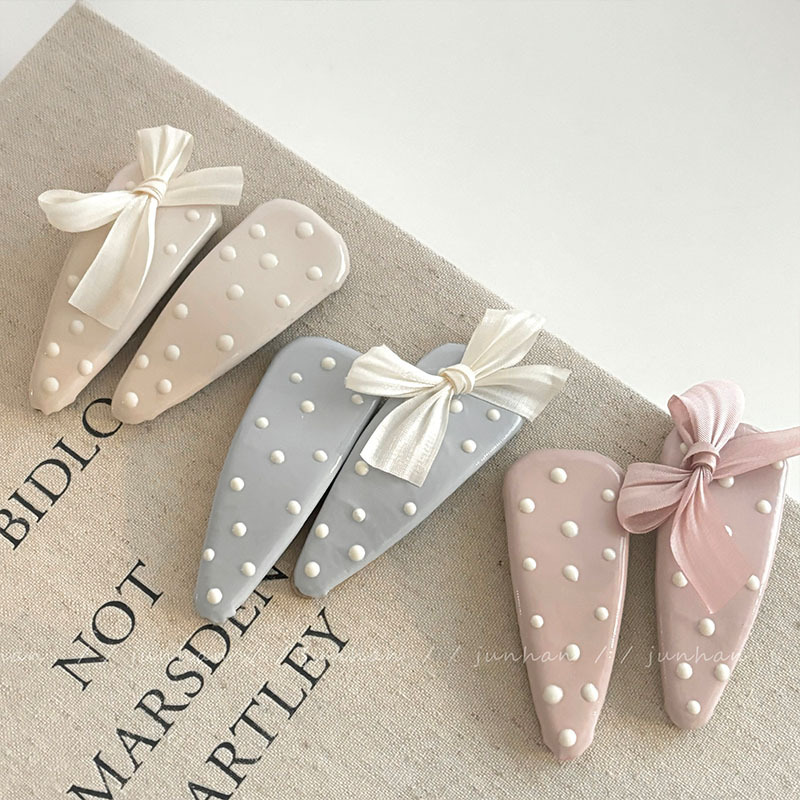 蓝色皮质波点水滴BB夹蝴蝶结