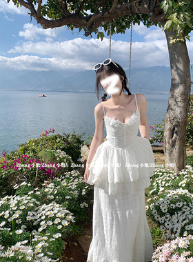 法式白色吊带无袖花苞连衣裙女夏季纯欲辣妹不规则蓬蓬裙度假长裙