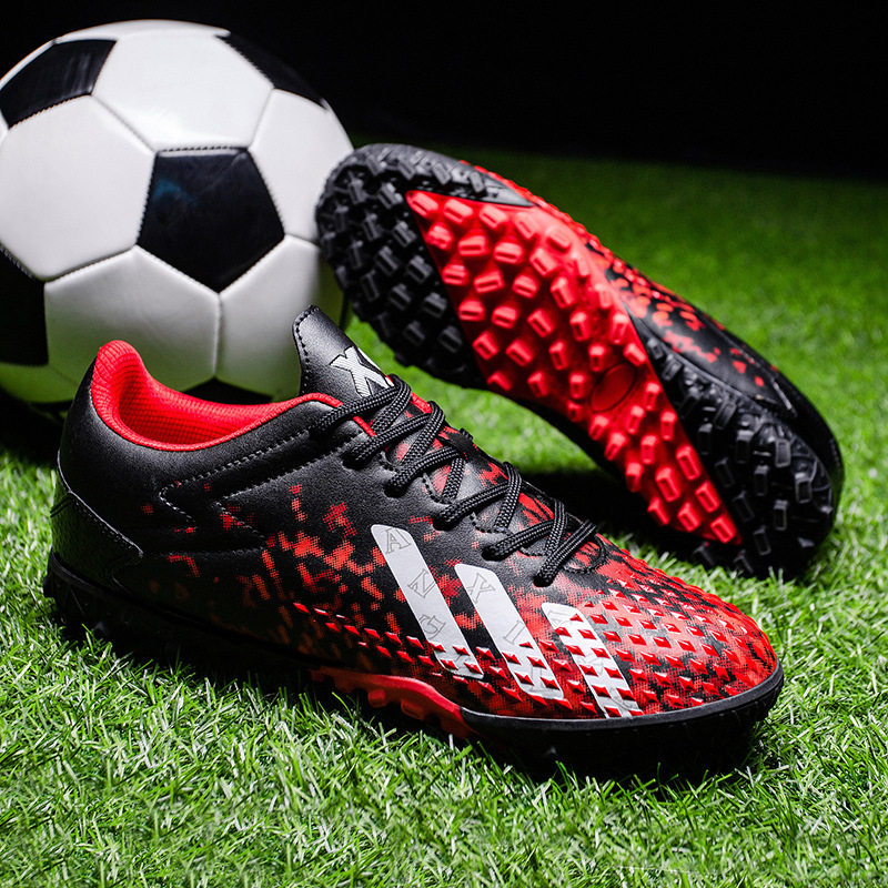 代发鸳鸯足球鞋男女孩学生儿童AG钉碎钉成人造草地比赛训练鞋跨境