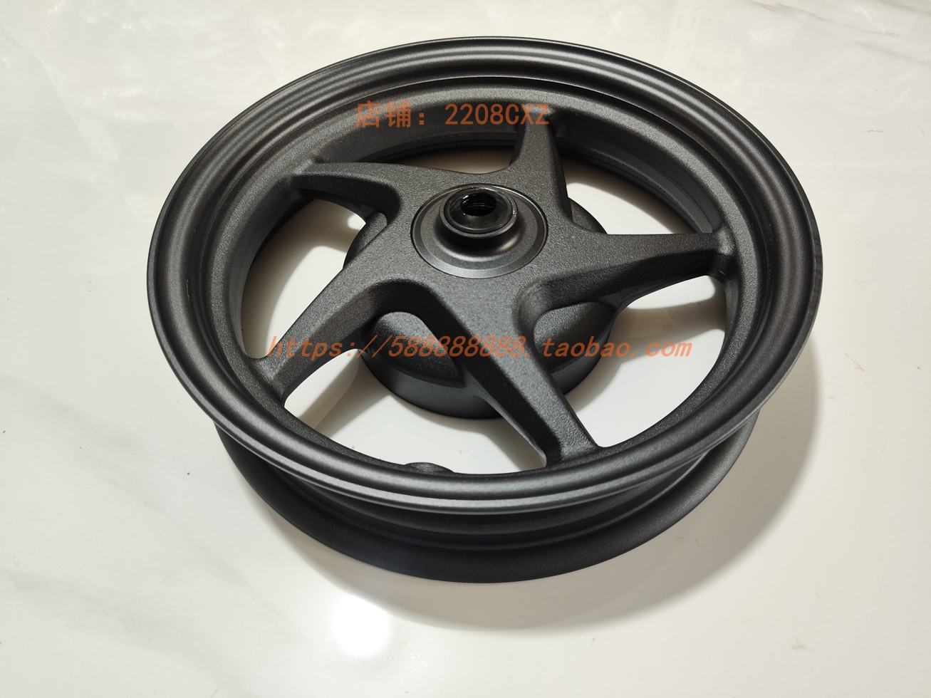 新大洲本田110E影前轮圈鼓刹