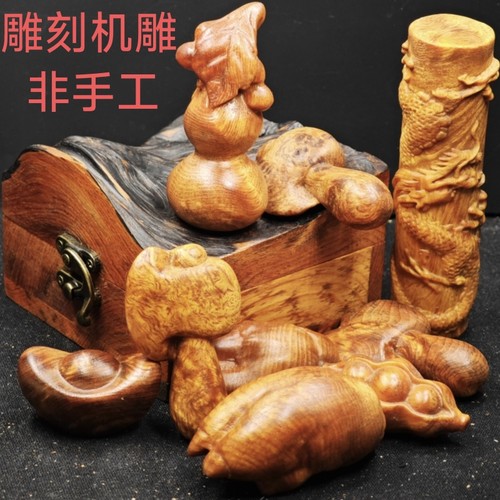 明子东北沉香琥珀木机雕手把件