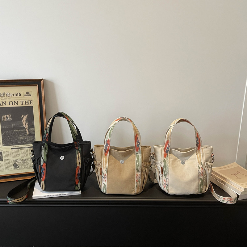 托特包女大容量2026新款斜挎帆布女式通勤高级感百搭单肩手提女包