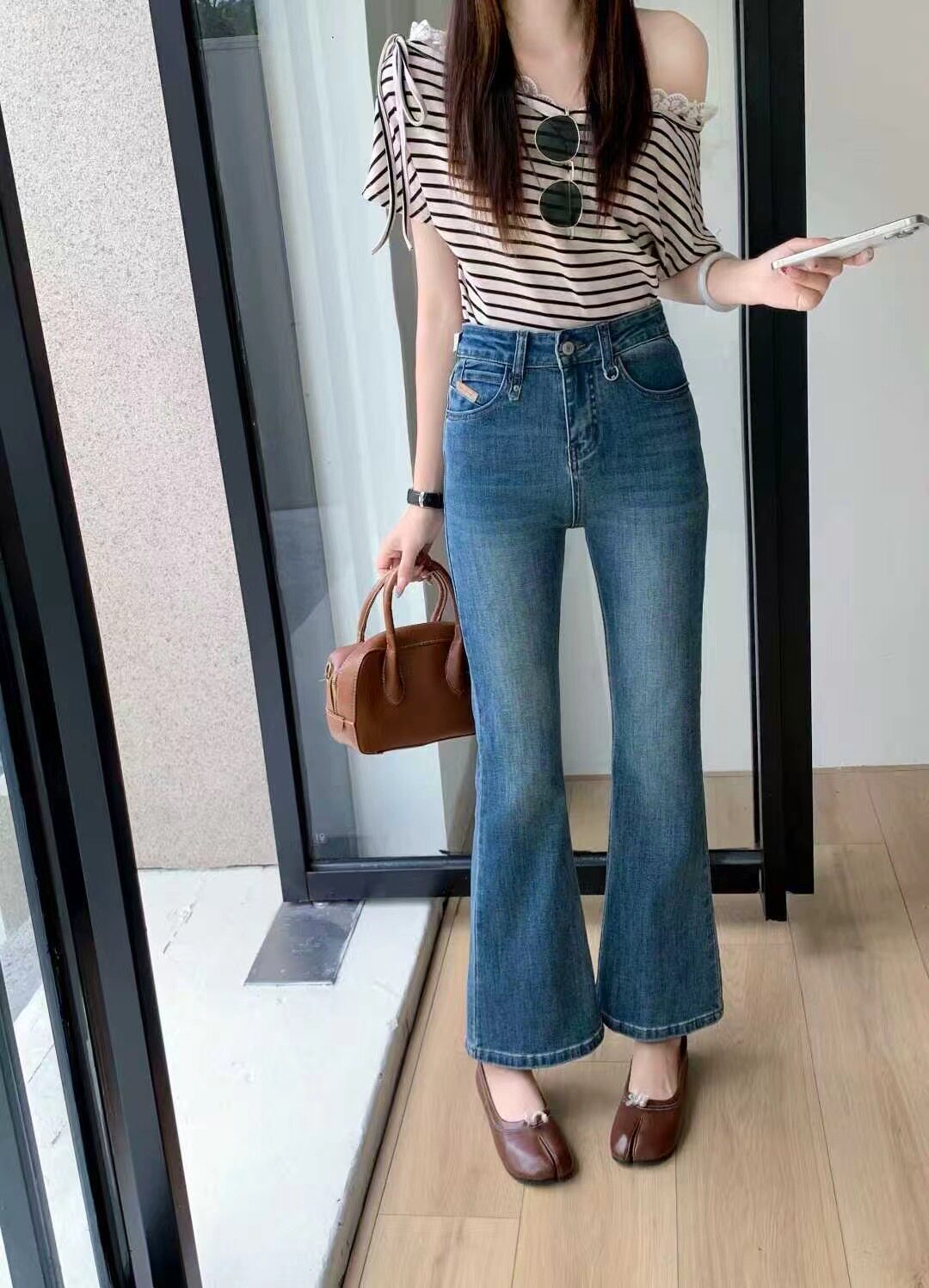 K8卡D8530欧货修身微喇牛仔裤女春季新款提臀显瘦弹力九分喇叭裤