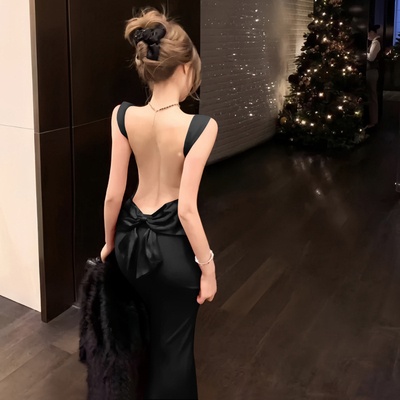 蝴蝶结露背海岛绝美连衣裙