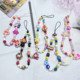 飞天小女警童趣手机链可爱挂件ccd相机挂饰挂绳手链条串珠卡通链